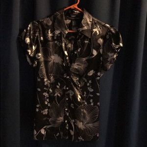 Black polyester blouse with silver flowers